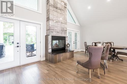 94 42Nd Street S, Wasaga Beach, ON - Indoor Photo Showing Living Room With Fireplace