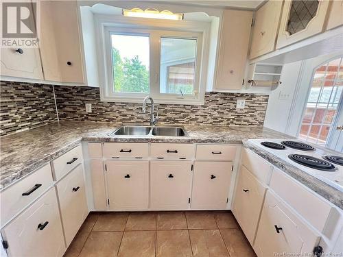 24 Catherine Street, Bathurst, NB - Indoor Photo Showing Kitchen With Double Sink