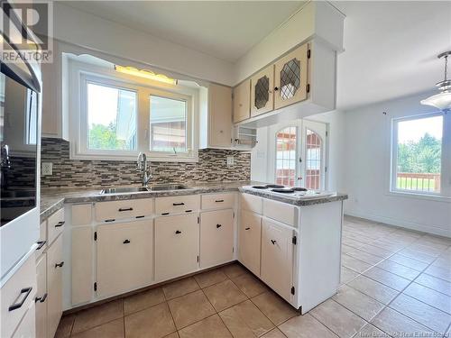 24 Catherine Street, Bathurst, NB - Indoor Photo Showing Kitchen With Double Sink