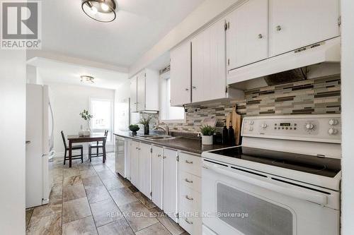 390 Satok Crescent, Milton (Timberlea), ON - Indoor Photo Showing Kitchen With Double Sink