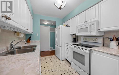 315 - 95 Wellington Street, Clarington (Bowmanville), ON - Indoor Photo Showing Kitchen With Double Sink