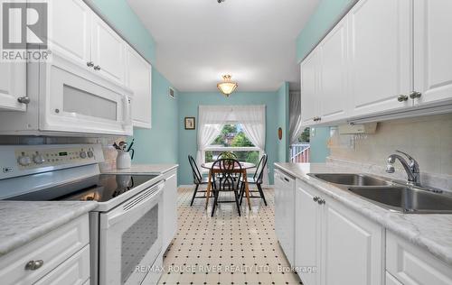 315 - 95 Wellington Street, Clarington (Bowmanville), ON - Indoor Photo Showing Kitchen With Double Sink