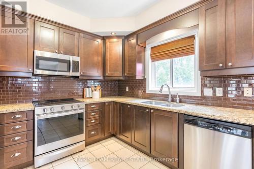 48 Windsor Crescent, Barrie (Innis-Shore), ON - Indoor Photo Showing Kitchen With Double Sink