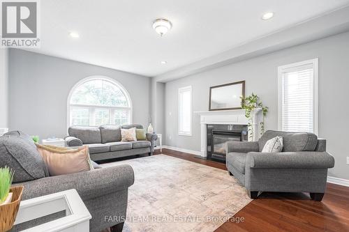 48 Windsor Crescent, Barrie (Innis-Shore), ON - Indoor Photo Showing Living Room With Fireplace