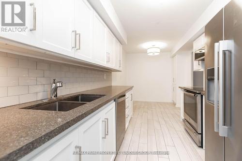 322 - 80 Front Street E, Toronto (Church-Yonge Corridor), ON - Indoor Photo Showing Kitchen With Double Sink