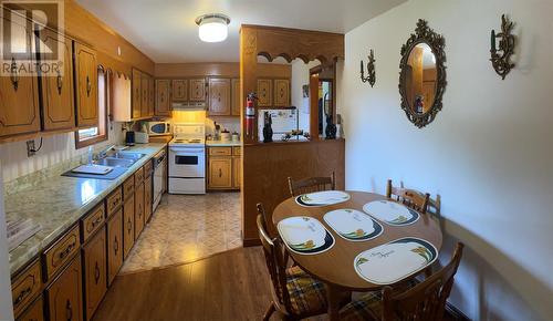 125-127 Main Street, Port Au Port West, NL - Indoor Photo Showing Kitchen With Double Sink