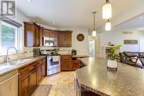 33 Spring Street, Mapleton, ON - Indoor Photo Showing Kitchen With Double Sink