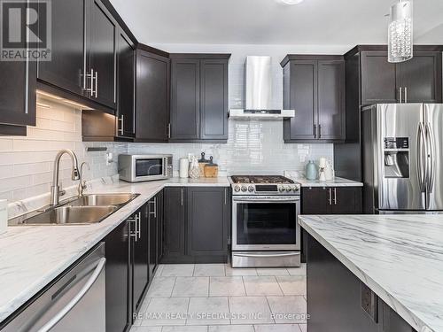 63 Leadenhall Road, Brampton, ON - Indoor Photo Showing Kitchen With Stainless Steel Kitchen With Double Sink With Upgraded Kitchen