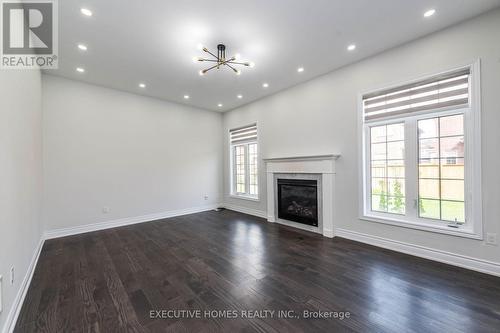 64 Wildflower Lane, Halton Hills (Georgetown), ON - Indoor Photo Showing Living Room With Fireplace