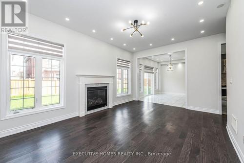 64 Wildflower Lane, Halton Hills (Georgetown), ON - Indoor Photo Showing Living Room With Fireplace