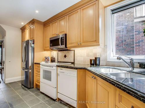 154 Mcrae Dr, Toronto, ON - Indoor Photo Showing Kitchen With Double Sink