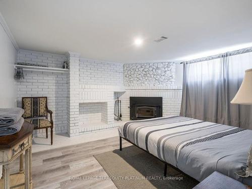 11 Jacinta Dr, Toronto, ON - Indoor Photo Showing Bedroom With Fireplace