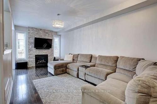 7 Chesterwood Cres, Brampton, ON - Indoor Photo Showing Living Room With Fireplace