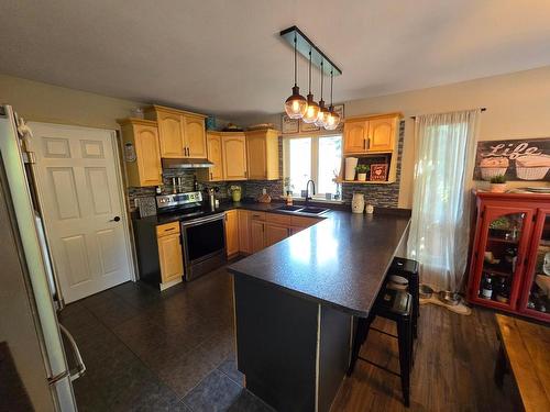 233 Blair Place, Clearwater, BC - Indoor Photo Showing Kitchen With Double Sink