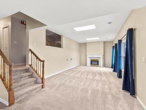 30-2080 Pacific Way, Kamloops, BC - Indoor Photo Showing Other Room With Fireplace