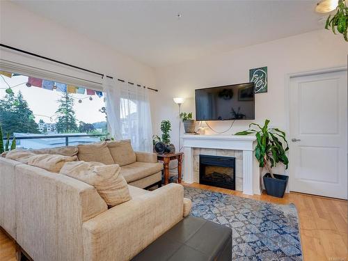 404-2747 Jacklin Rd, Langford, BC - Indoor Photo Showing Living Room With Fireplace