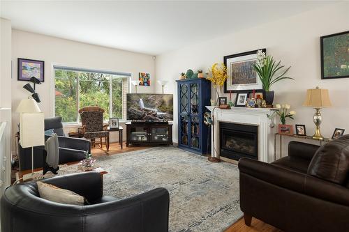 12-1700 Deleenheer Road, Vernon, BC - Indoor Photo Showing Living Room With Fireplace