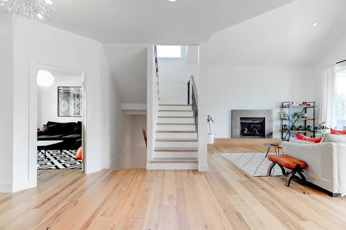 279 Upper Canyon Drive, Kelowna, BC - Indoor Photo Showing Other Room With Fireplace