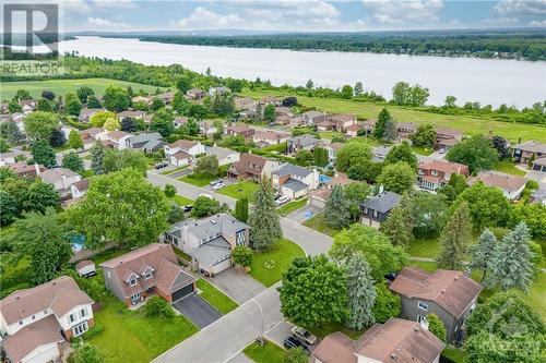 So close to the water! Paths outside your front door that lead you right to it! - 854 Explorer Lane, Ottawa, ON - Outdoor With Body Of Water With View