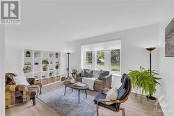 Sunken living room with loads of natural light - 