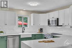 Gorgeous two-tone kitchen with dreamy apron sink - 