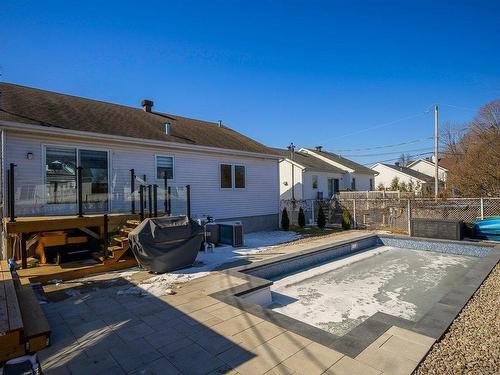 Back facade - 14845 Rue Du Froment, Mirabel, QC - Outdoor With In Ground Pool