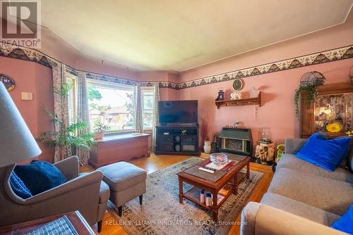 164 Bond Street N, Hamilton, ON - Indoor Photo Showing Living Room With Fireplace