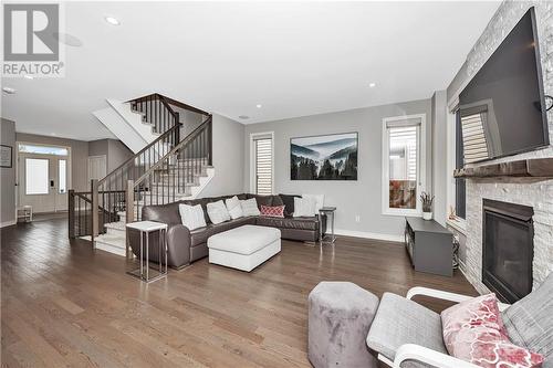 1115 Beckett Crescent, Ottawa, ON - Indoor Photo Showing Living Room With Fireplace