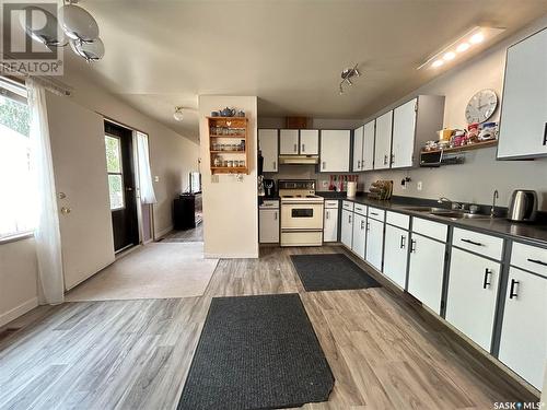 319 Barsness Bay, Richmound, SK - Indoor Photo Showing Kitchen With Double Sink