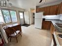 319 Barsness Bay, Richmound, SK  - Indoor Photo Showing Kitchen With Double Sink 