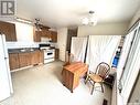 319 Barsness Bay, Richmound, SK  - Indoor Photo Showing Kitchen With Double Sink 