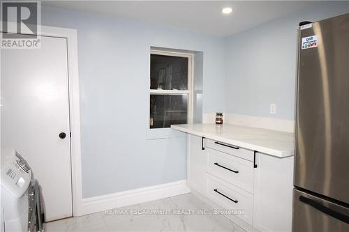 19 Emerald Street N, Hamilton, ON - Indoor Photo Showing Laundry Room