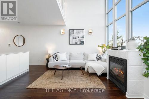 526 - 250 Manitoba Street, Toronto (Mimico), ON - Indoor Photo Showing Living Room With Fireplace