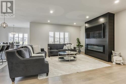 2136 Tokala Trail, London, ON - Indoor Photo Showing Living Room With Fireplace