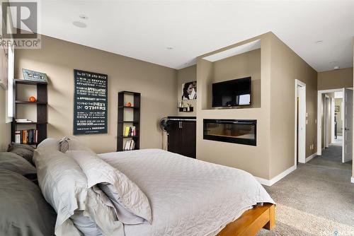 5245 Aviator Crescent, Regina, SK - Indoor Photo Showing Bedroom With Fireplace