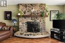 161 3Rd Street, Pilot Butte, SK  - Indoor Photo Showing Living Room With Fireplace 