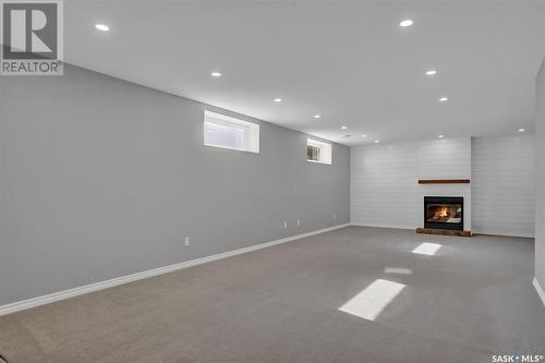 2015 E Ball Road, Regina, SK - Indoor With Fireplace