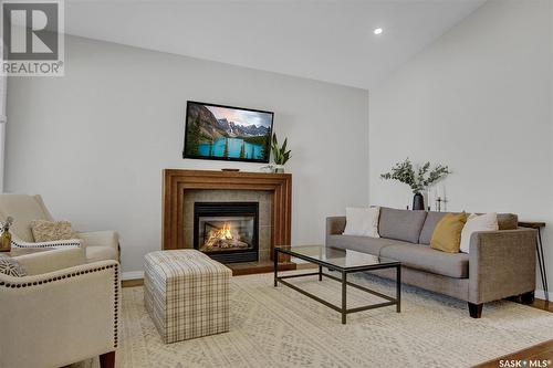 2015 E Ball Road, Regina, SK - Indoor Photo Showing Living Room With Fireplace