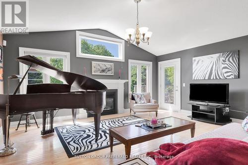 14 - 1625 Attawandaron Road, London, ON - Indoor Photo Showing Living Room With Fireplace