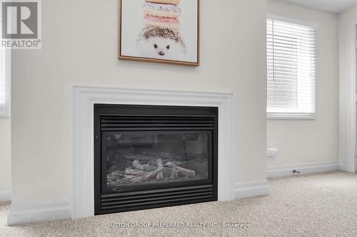 14 - 1625 Attawandaron Road, London, ON - Indoor Photo Showing Living Room With Fireplace