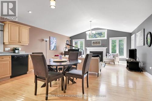 14 - 1625 Attawandaron Road, London, ON - Indoor Photo Showing Dining Room With Fireplace