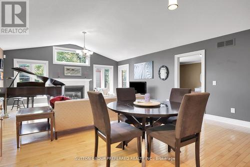 14 - 1625 Attawandaron Road, London, ON - Indoor Photo Showing Dining Room With Fireplace