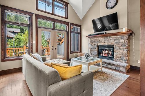 C - 425 Canyon Trail, Fernie, BC - Indoor Photo Showing Living Room With Fireplace