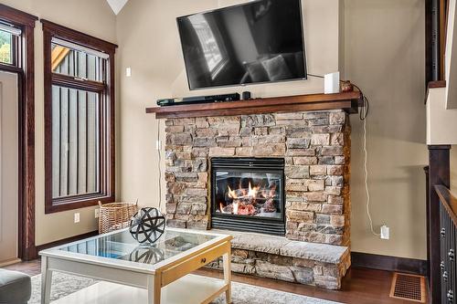 C - 425 Canyon Trail, Fernie, BC - Indoor Photo Showing Living Room With Fireplace