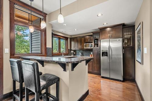 C - 425 Canyon Trail, Fernie, BC - Indoor Photo Showing Living Room With Fireplace