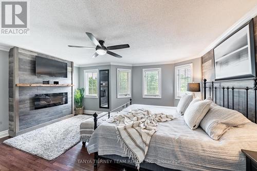 62 Wyndfield Crescent, Whitby (Pringle Creek), ON - Indoor Photo Showing Bedroom With Fireplace