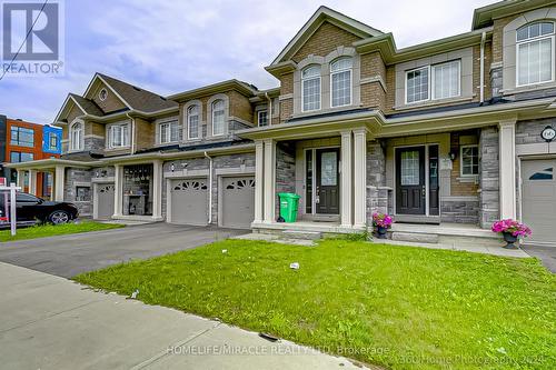 64 Finegan Circle, Brampton (Brampton West), ON - Outdoor With Facade