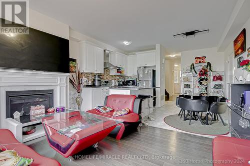 64 Finegan Circle, Brampton, ON - Indoor Photo Showing Living Room With Fireplace