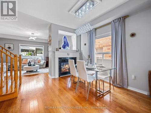 20 Prima Vista Court, Brampton, ON - Indoor Photo Showing Dining Room With Fireplace