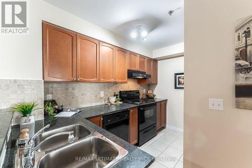 3301 - 4 Dayspring Circle, Brampton (Goreway Drive Corridor), ON - Indoor Photo Showing Kitchen With Double Sink